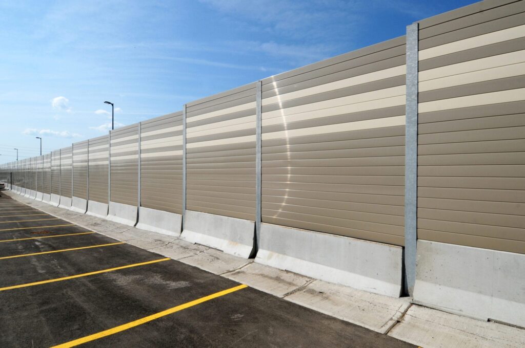 Parking lot sound barrier walls